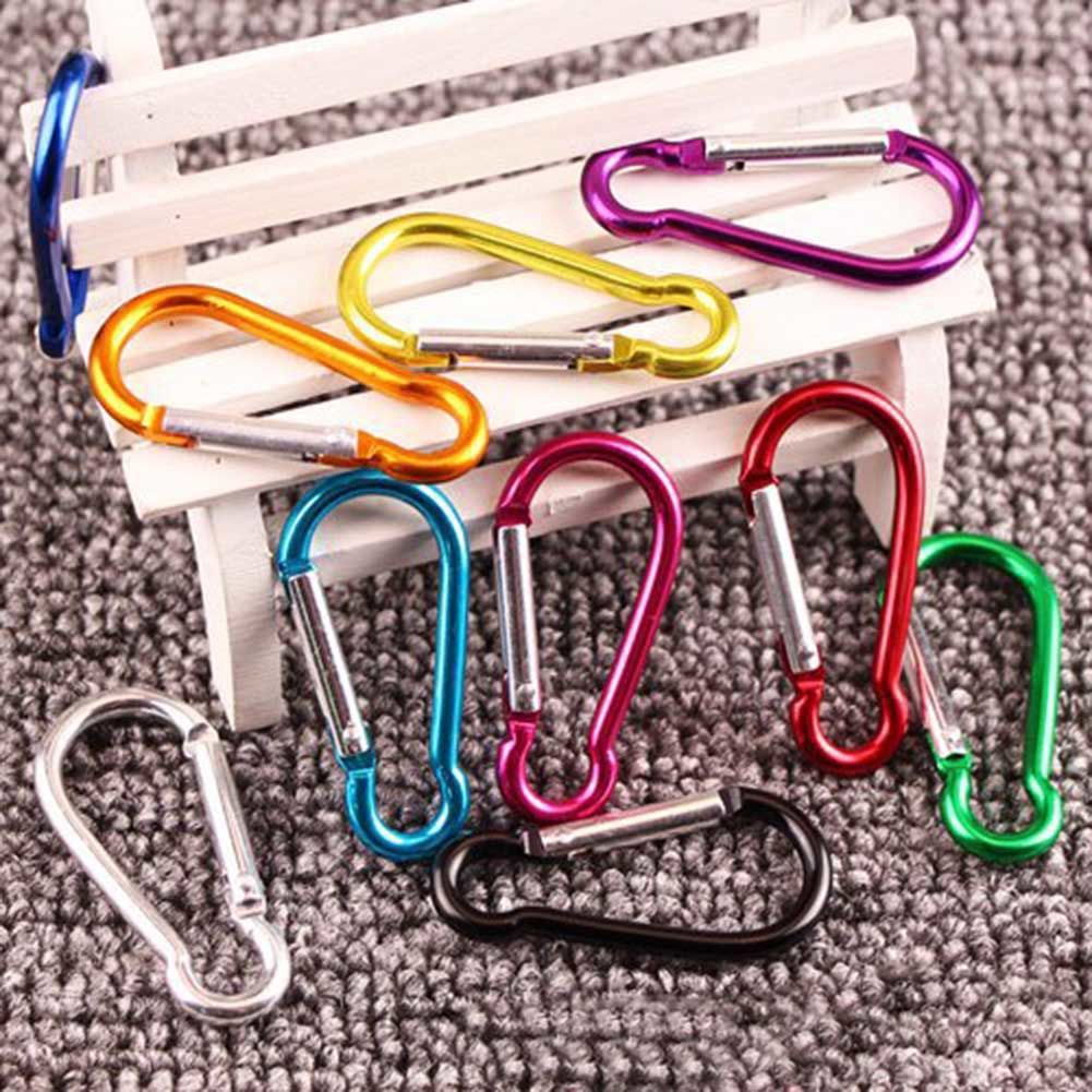 Compact aluminum accessory clip detail with spring gate