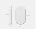 White wireless charging pad shown from the top and side with supplier dimension annotations